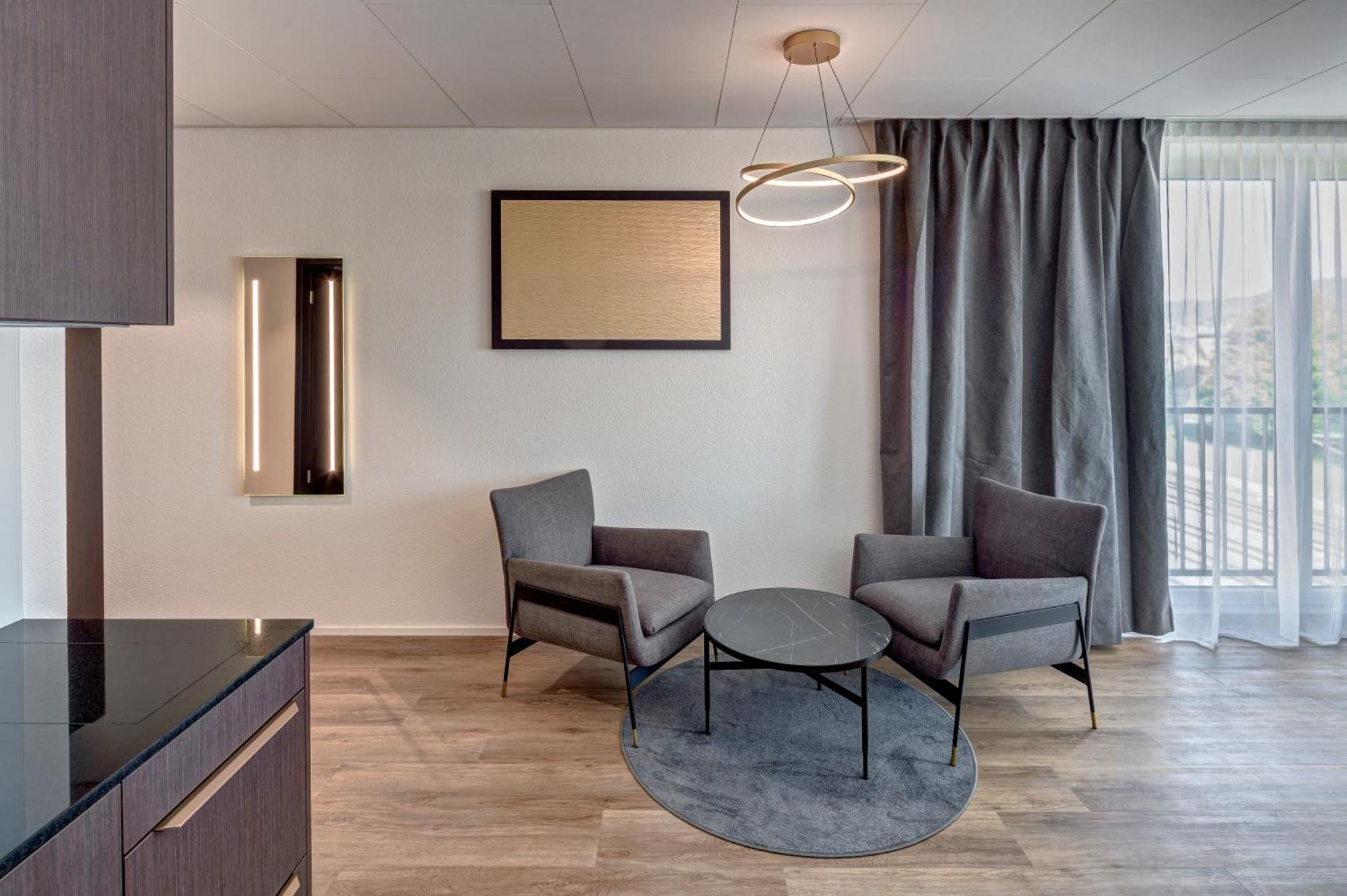 Mooi Apartments Шлирен Номер фото